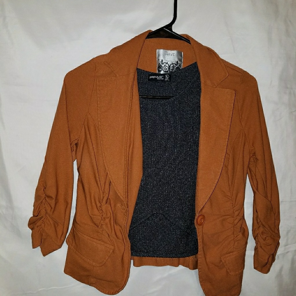 Orange-brown blazer.